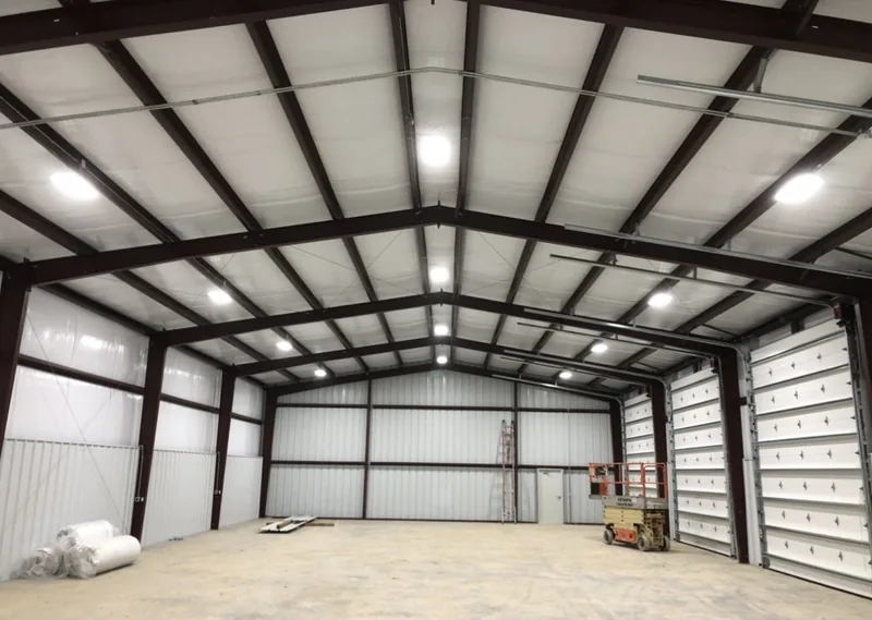 Inside a finished pole barn under new lights, wired by DC Electric