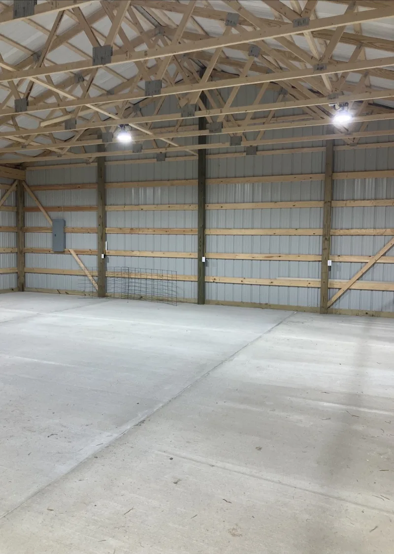 Inside a new pole building with the lights on, wired by DC Electric